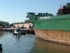 Being towed down the Miami River and then out to the ocean