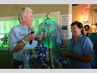 John Burke and Betty Olliges running the auctions and raffles.