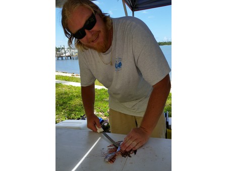 This is Ryan Lindh and we estimate that he has filleted more than 1,000 lionfish to date.